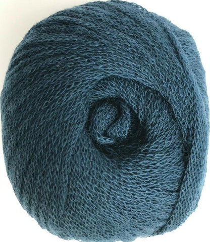 Blue skein of yarn on a white background