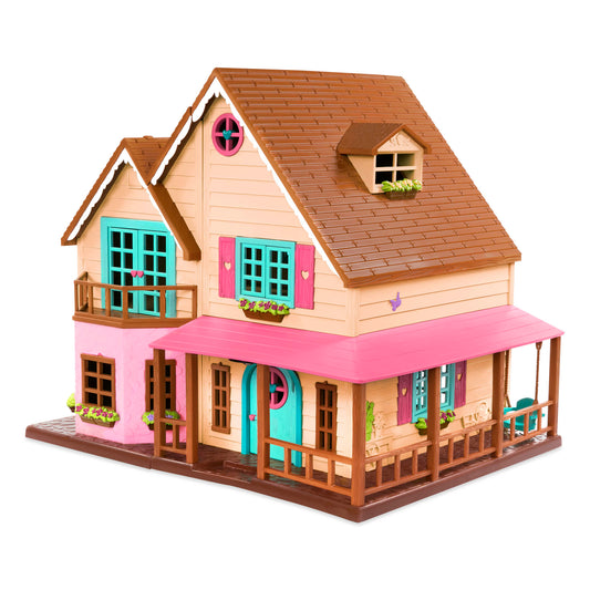Toy dollhouse with pink and brown exterior on a white background