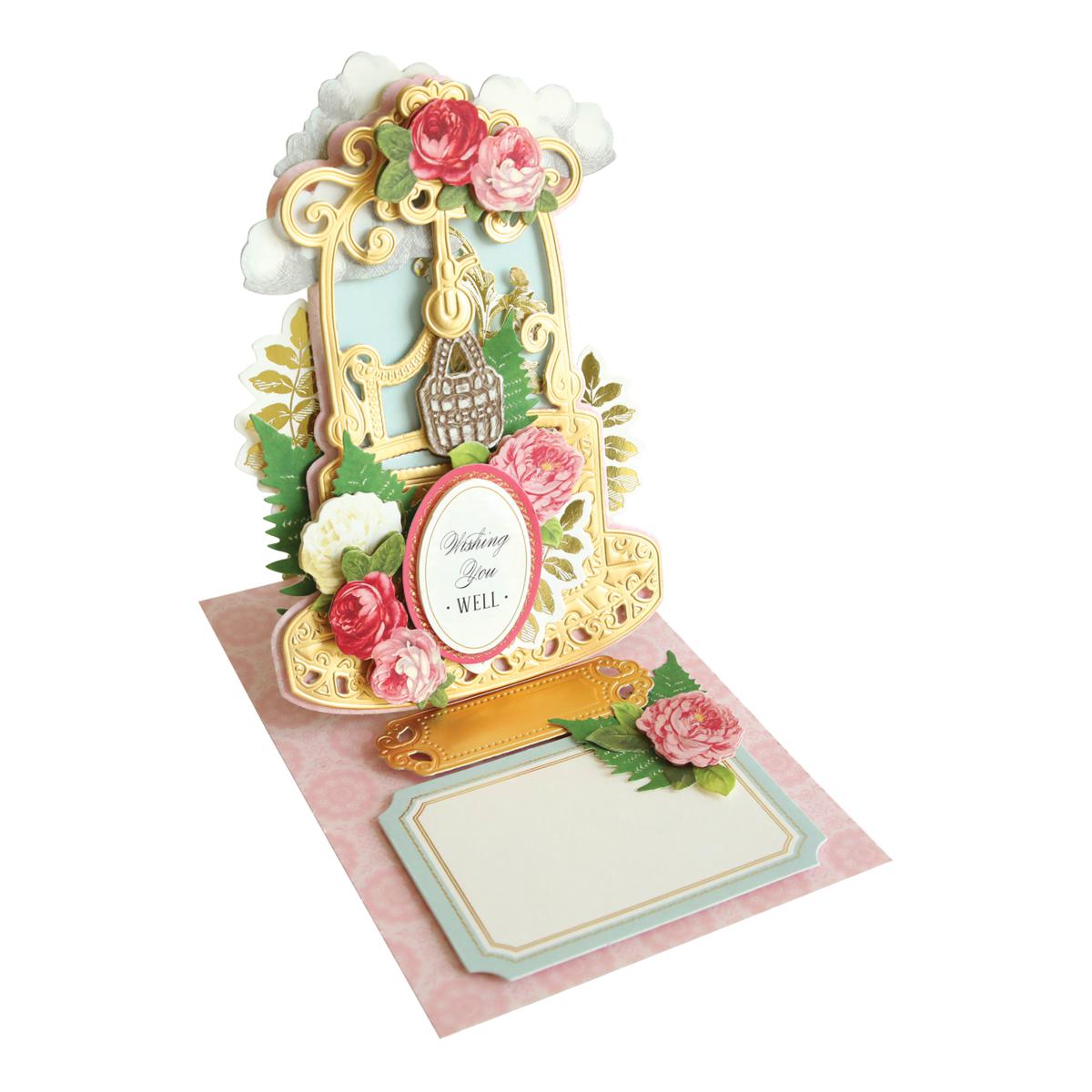 Decorative greeting card with floral design and ornate frame on a white background