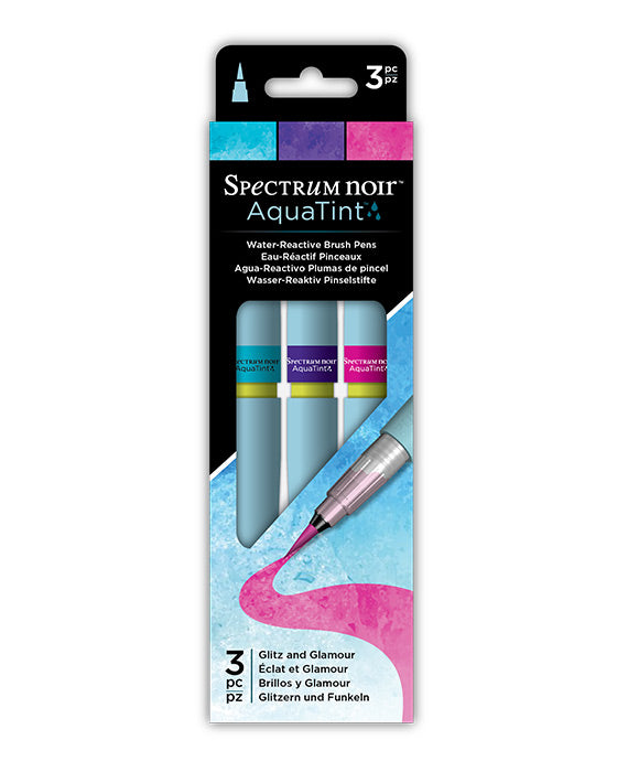 Packaging of Spectrum Noir AquaTint water-reactive brush pens with a black lid.