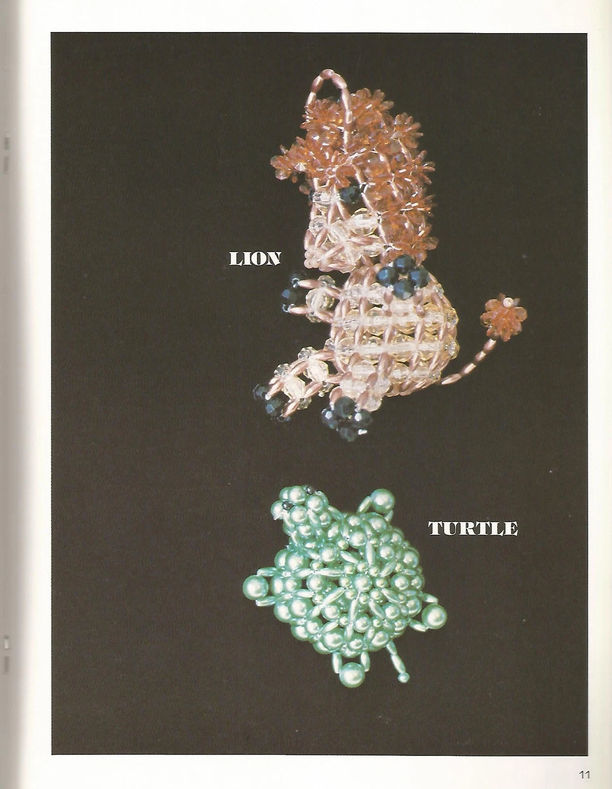 Beaded lion and turtle figurines on a dark background