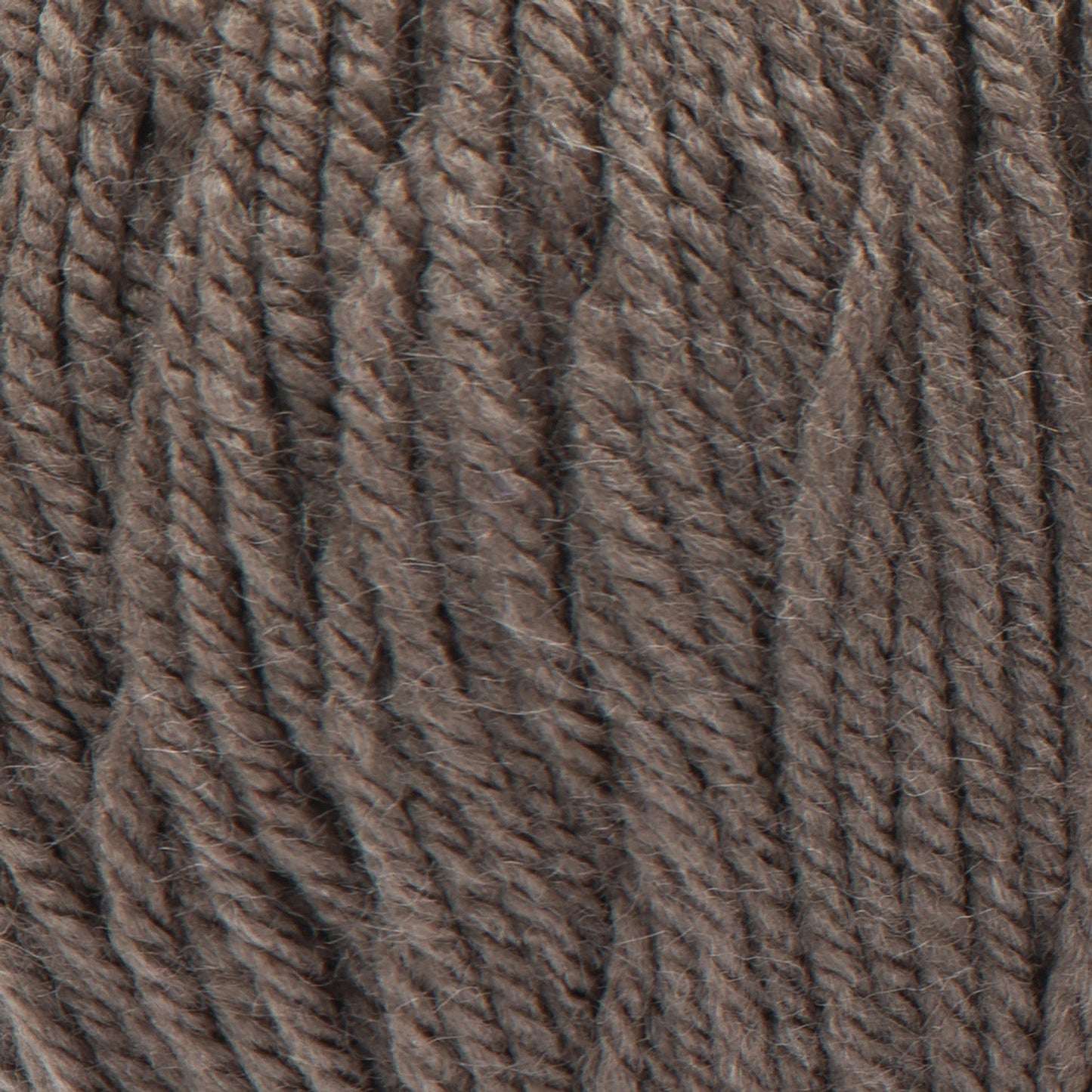 Close-up of brown yarn with a textured pattern