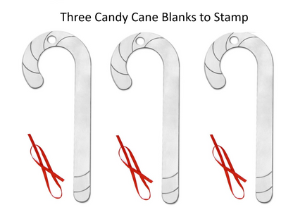 Three candy cane blanks with red stamp designs on a white background