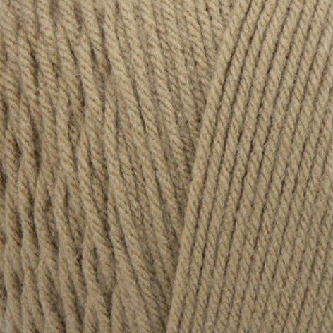 Close-up of beige yarn with a textured pattern