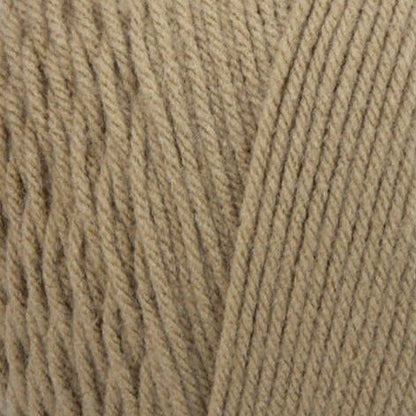 Close-up of beige yarn with a textured pattern