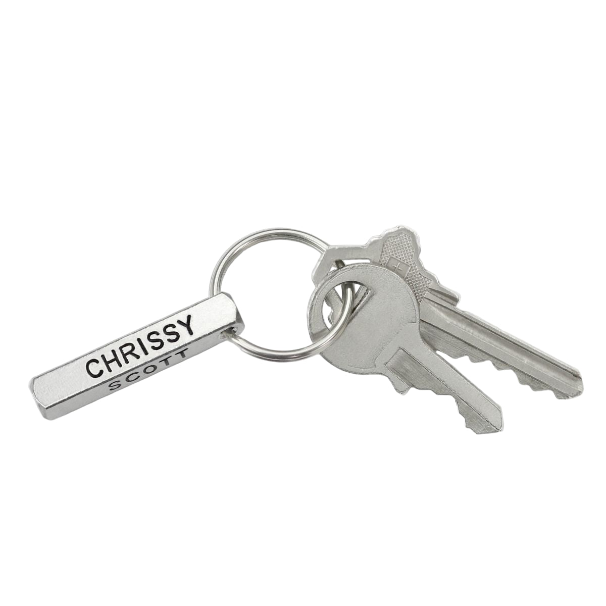 Keychain with keys and a name tag on a white background