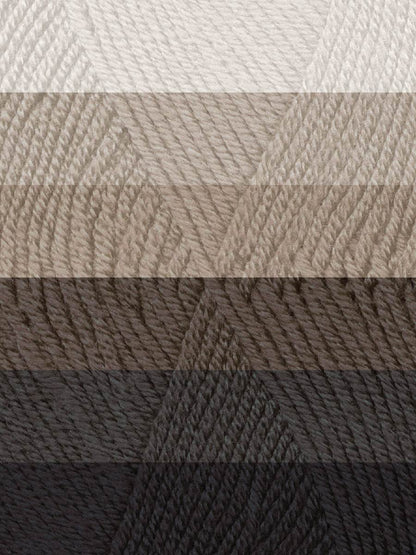 Close-up of textured yarn swatch in various shades of brown and gray.