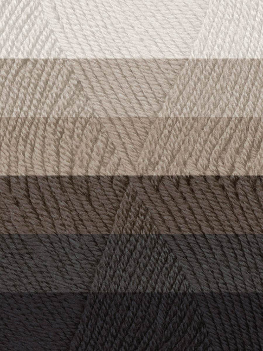 Close-up of textured yarn swatch in various shades of brown and gray.