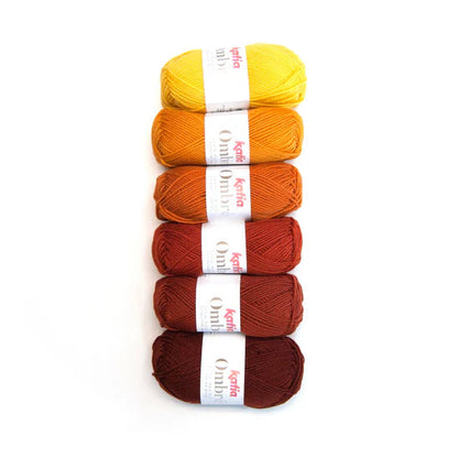 Five skeins of yarn in yellow, orange, and red on a white background