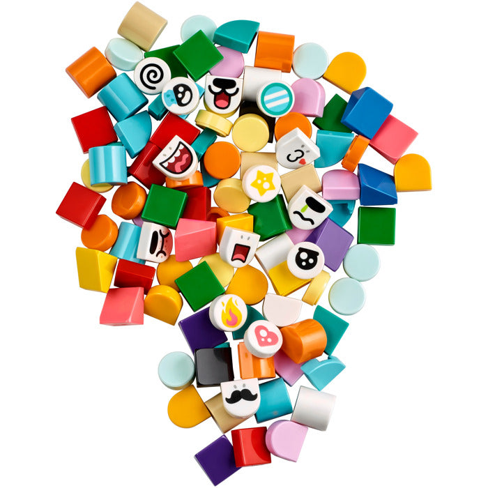 Colorful assortment of decorative charms on a white background
