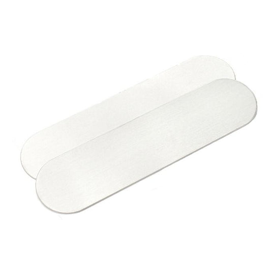 Set of metal bands and pliers on a white background