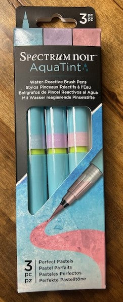 An image of a package of Spectrum Noir AquaTint water-reactive brush pens, 3-pack, in the 'Perfect Pastels' color set. 