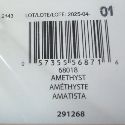 Close-up of a product label with a barcode and text on a textured surface.