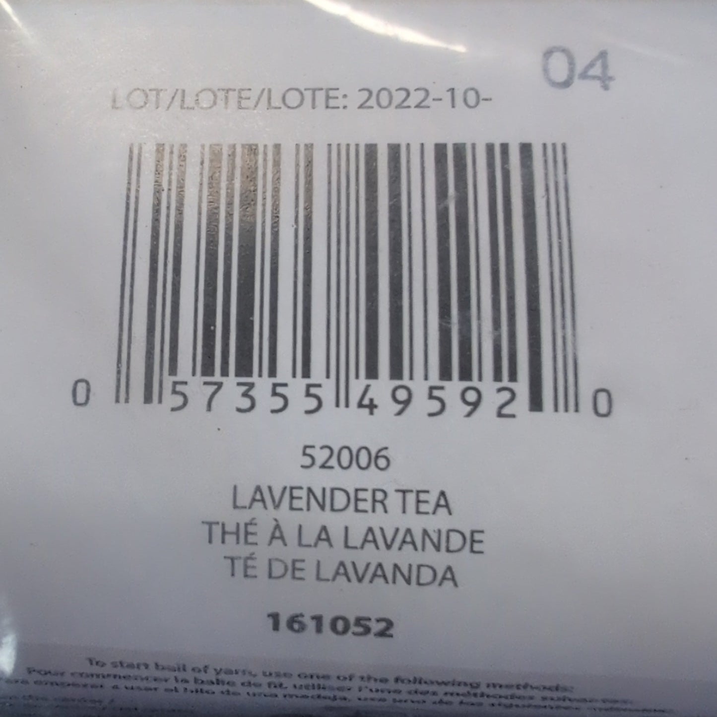 Yarn ball with label and barcode on a textured surface