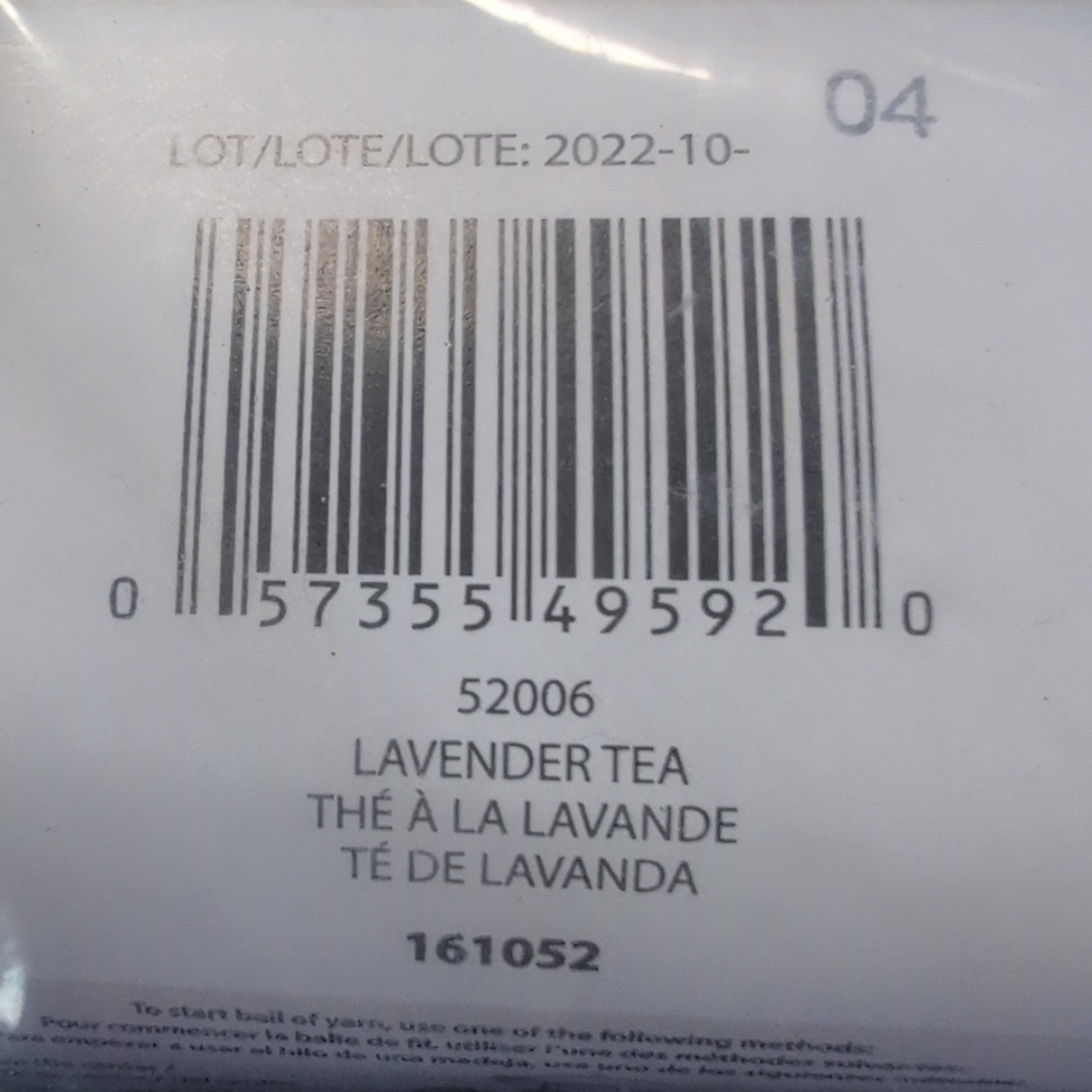 Yarn ball with label and barcode on a textured surface
