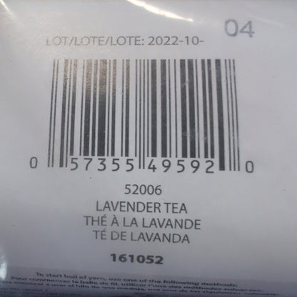 Yarn ball with label and barcode on a textured surface