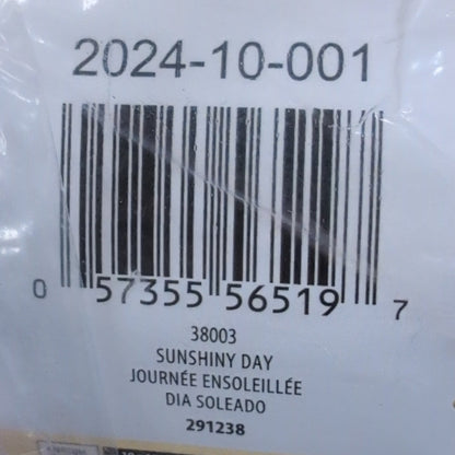 Product in clear plastic packaging with a label and barcode on a wooden surface