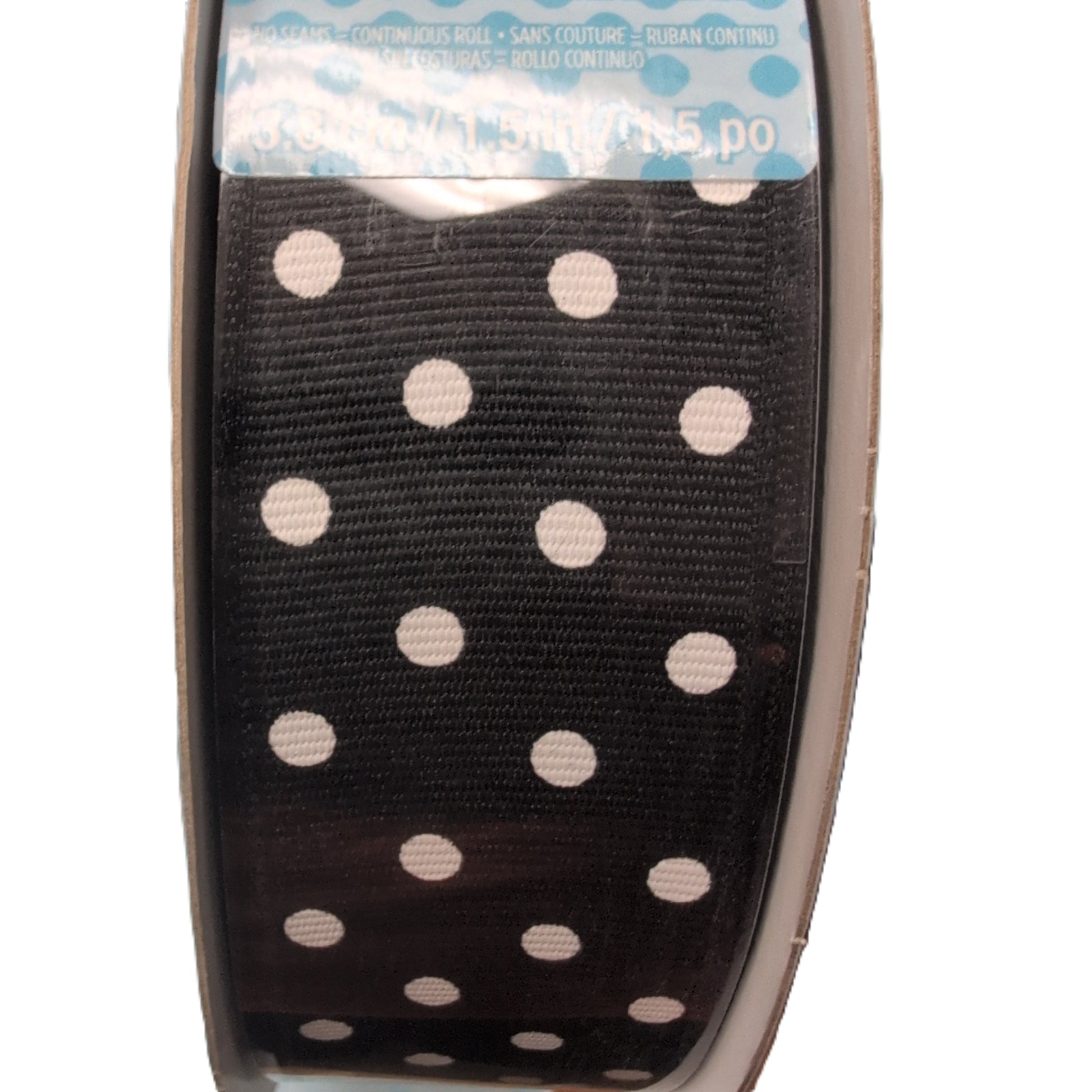 Black ribbon with white polka dots in packaging