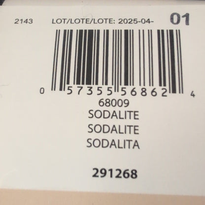 Close-up of a label with a barcode and text on a dark background