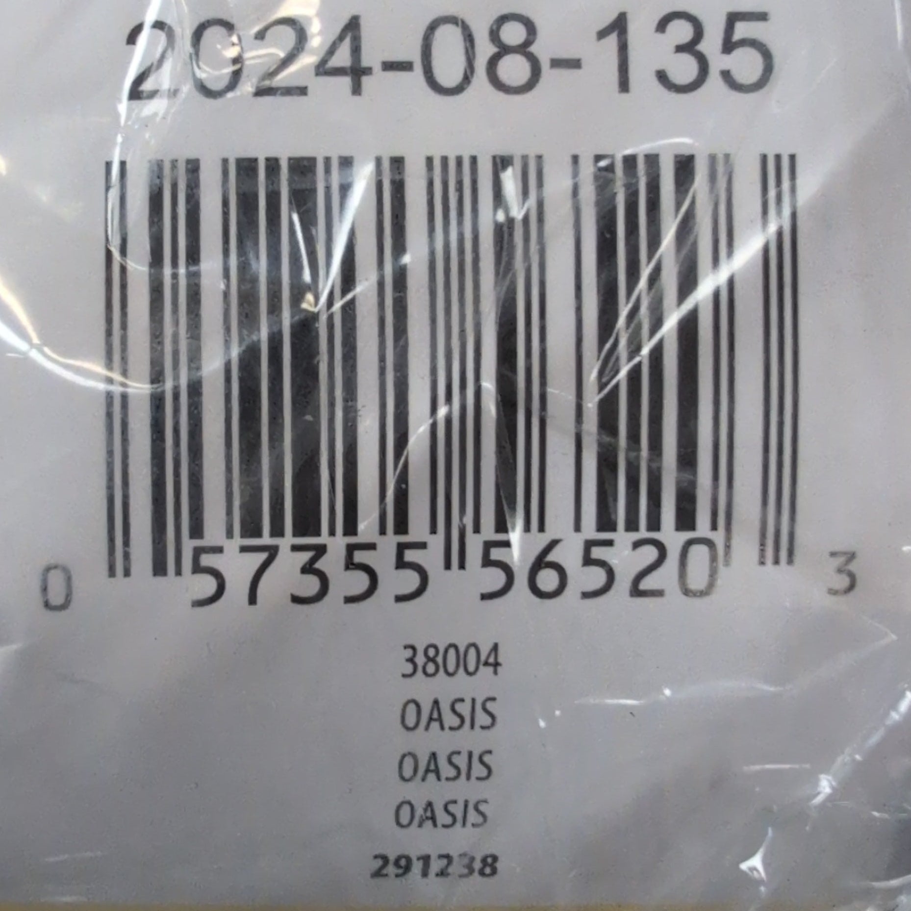 Product with a barcode label and text on a clear plastic bag.