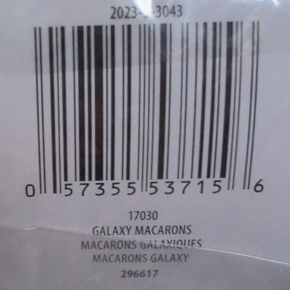 Ball of yarn with a label showing brand information on a wooden surface