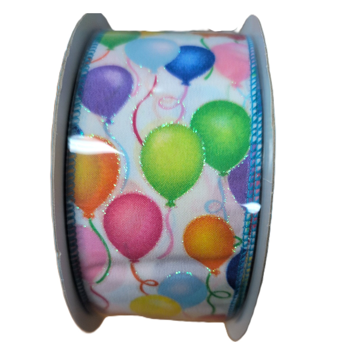 Spool of ribbon with colorful balloon design on a white background