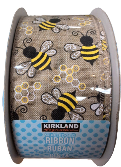 Spool of Kirkland wire-edged ribbon with bee pattern