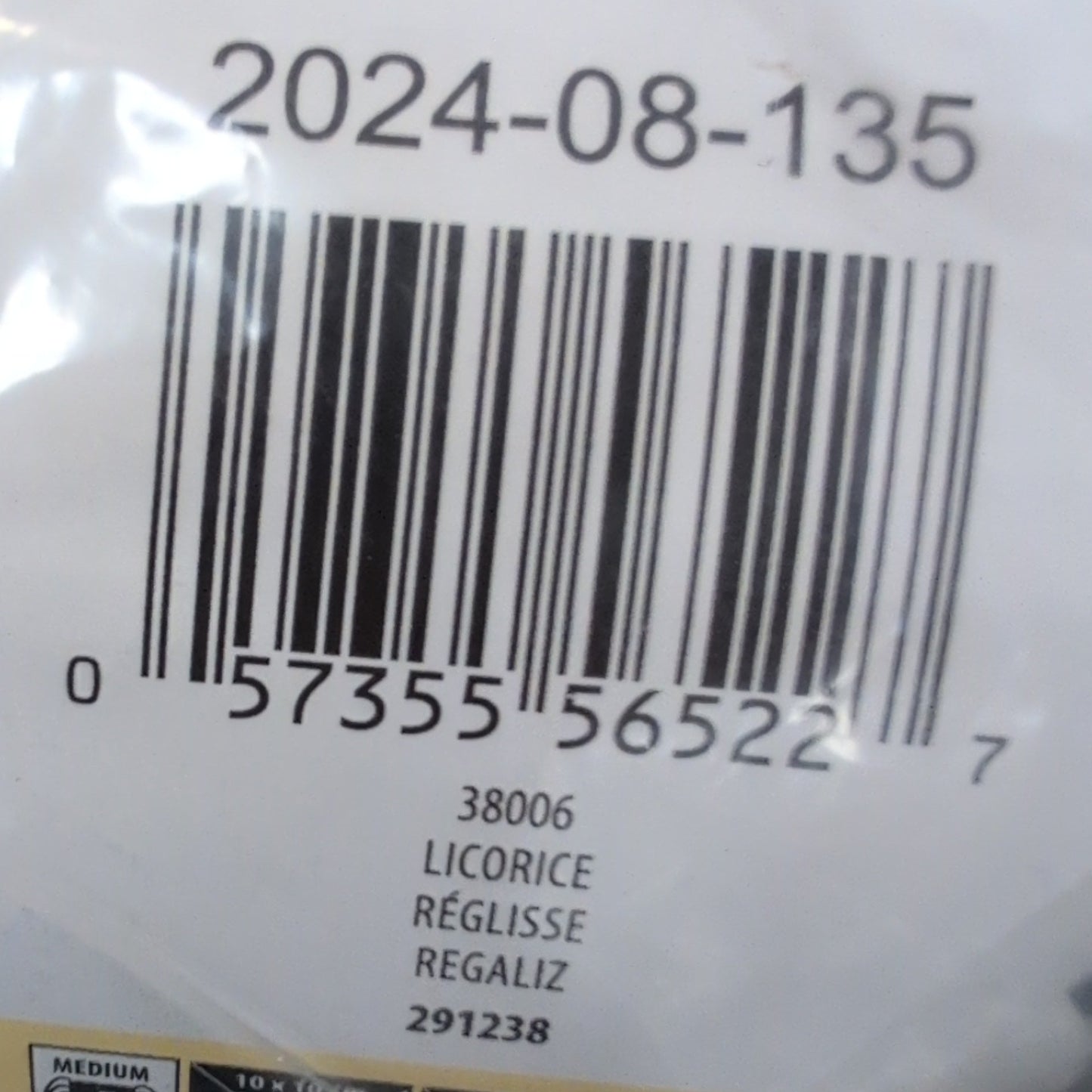 Packaged product with a barcode label on a plain background