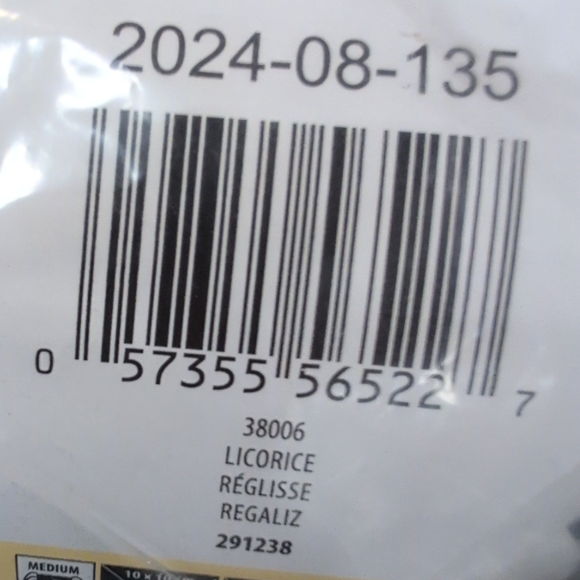 Packaged product with a barcode label on a plain background