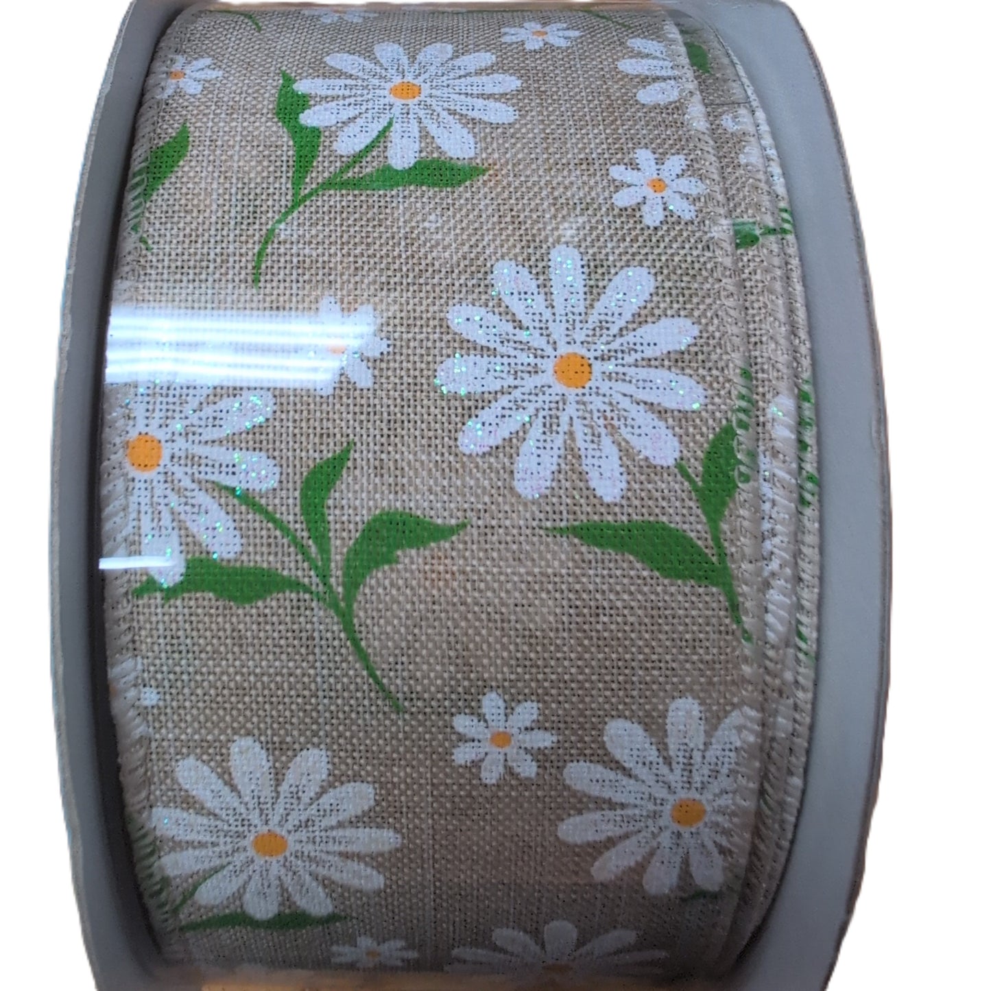 Roll of ribbon with floral pattern on a white background