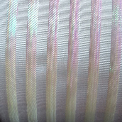 Close-up of fabric with multicolored stripes on a gray background