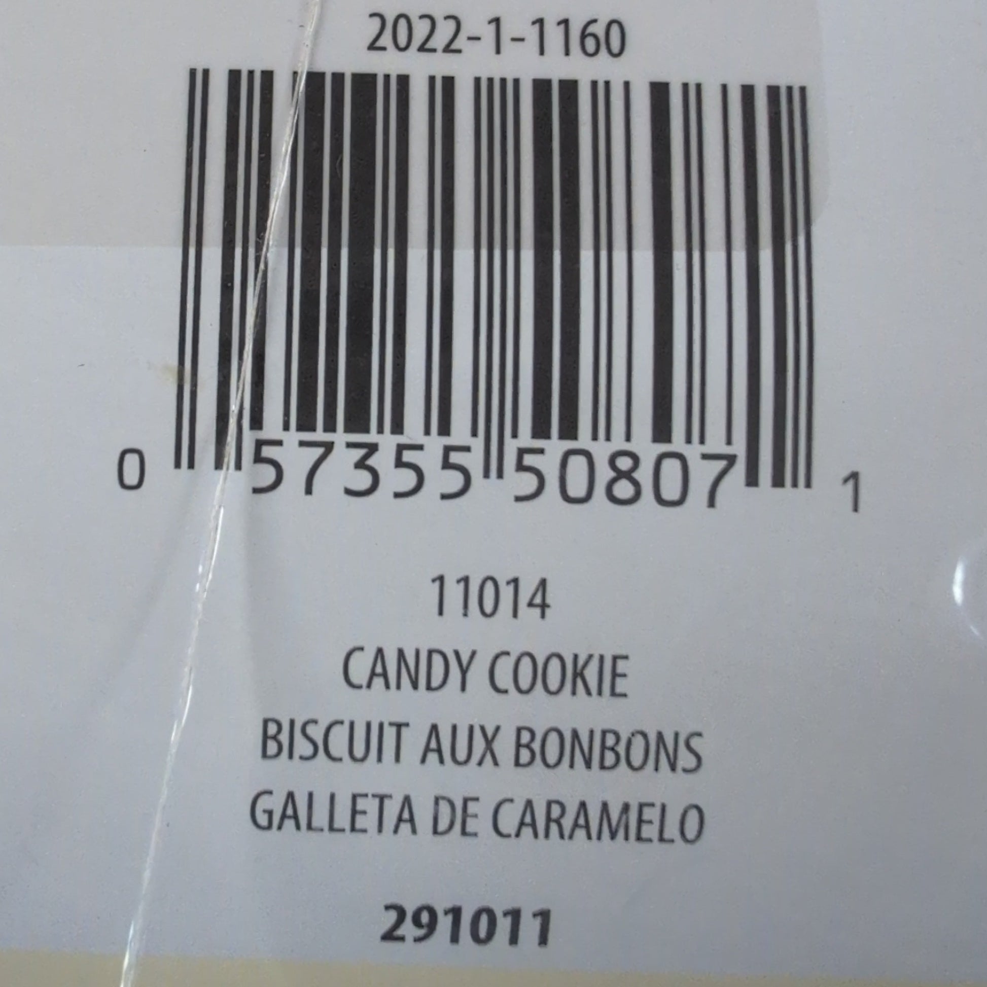 Product label with barcode and text on a textured surface