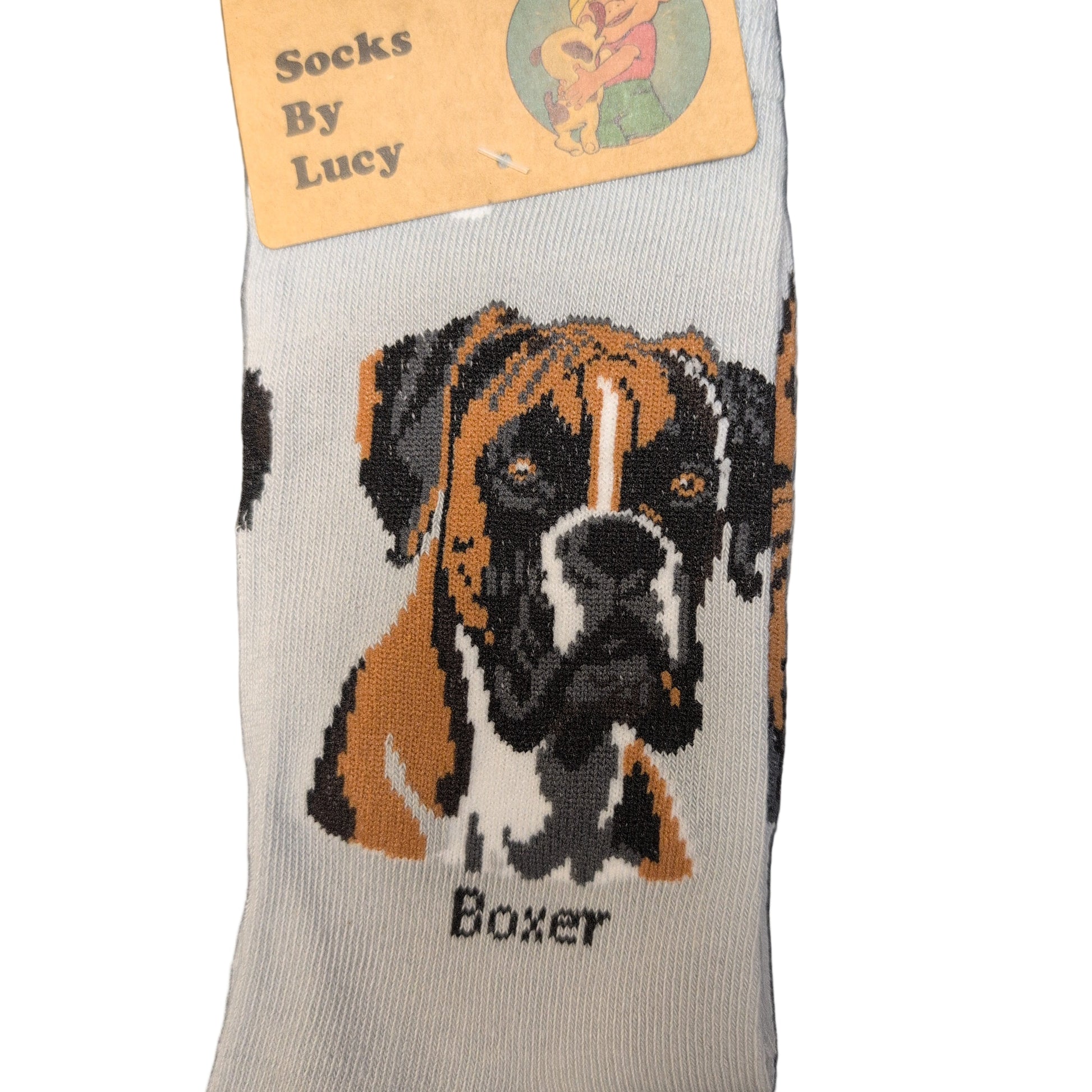 Sock with boxer dog design and tag on a dark surface