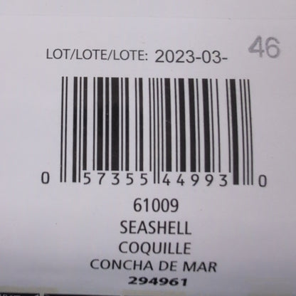 Close-up of a product label with barcodes and text on a textured surface
