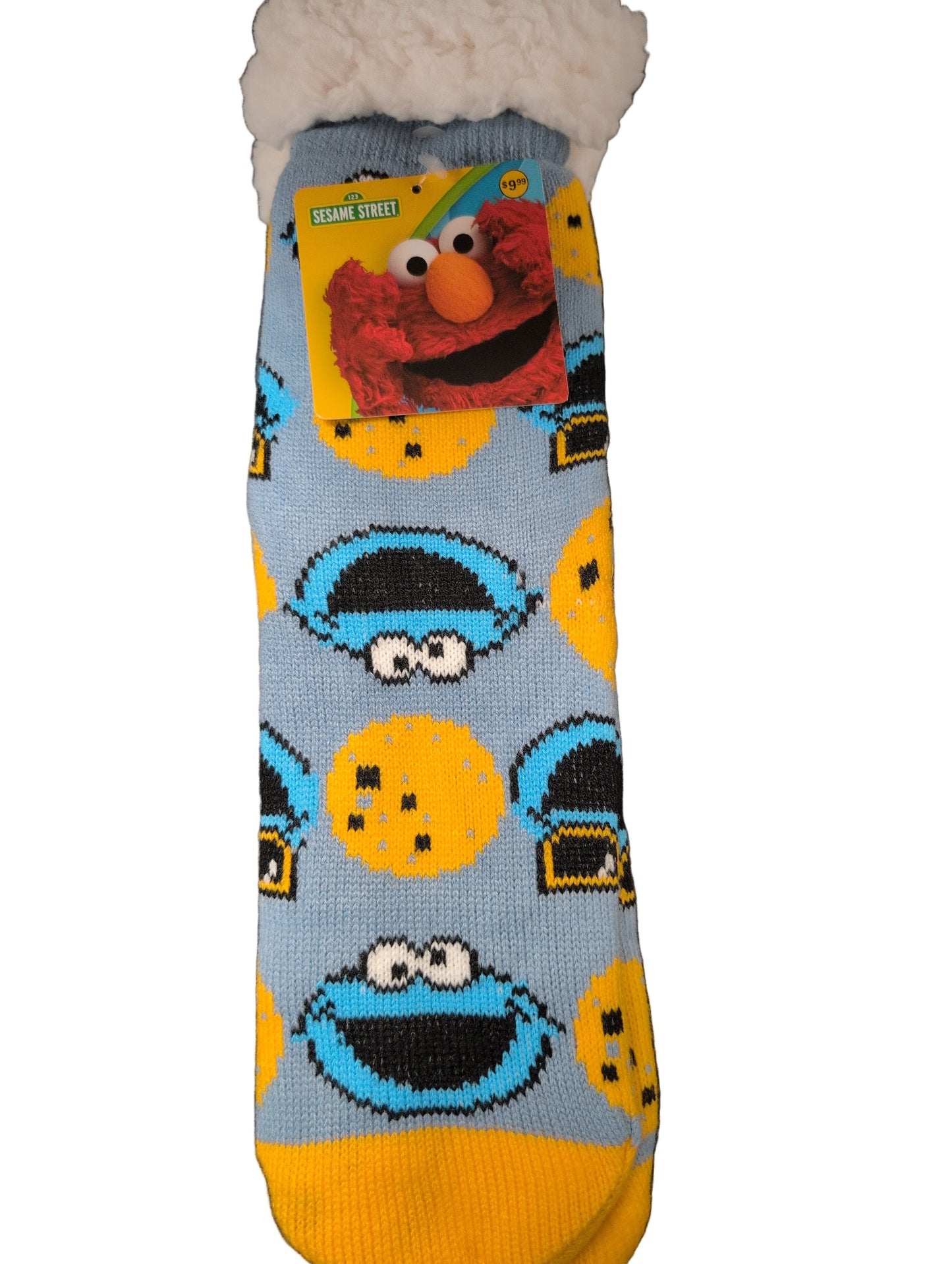 Colorful cartoon-themed sock on a dark surface