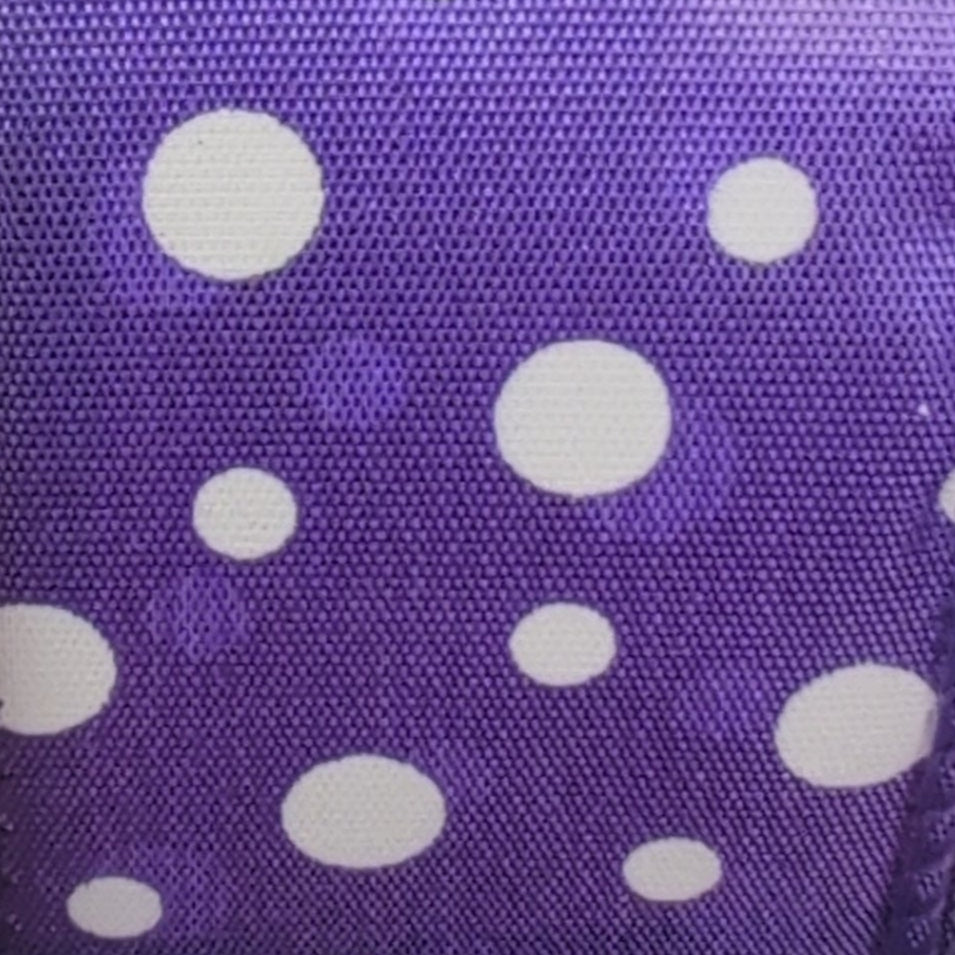Purple fabric with white polka dots