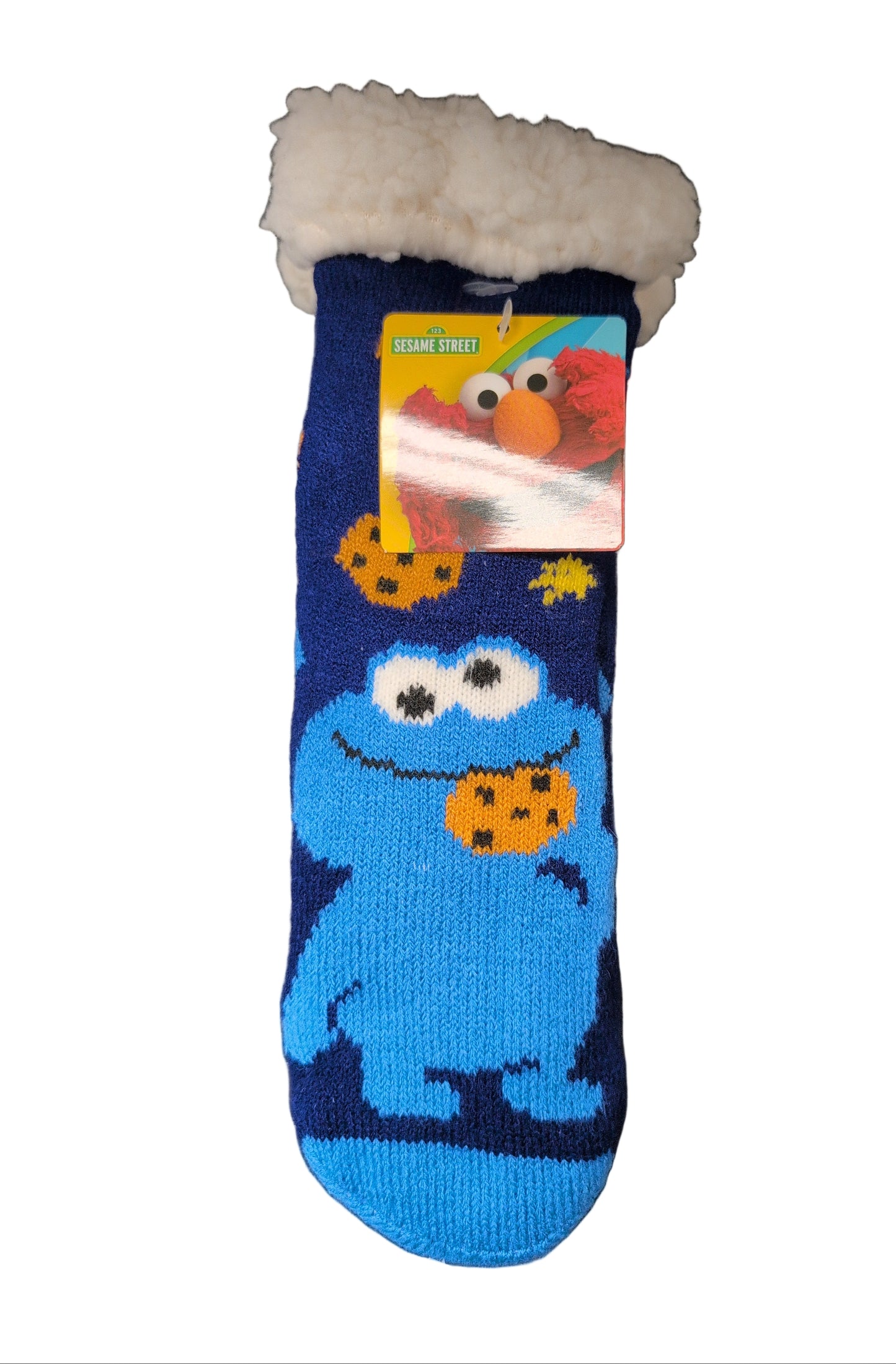Children's sock with Cookie Monster design on a metallic surface