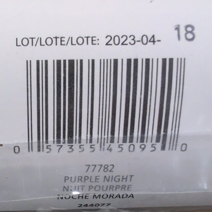Close-up of a product label with a barcode and text on a blue background.