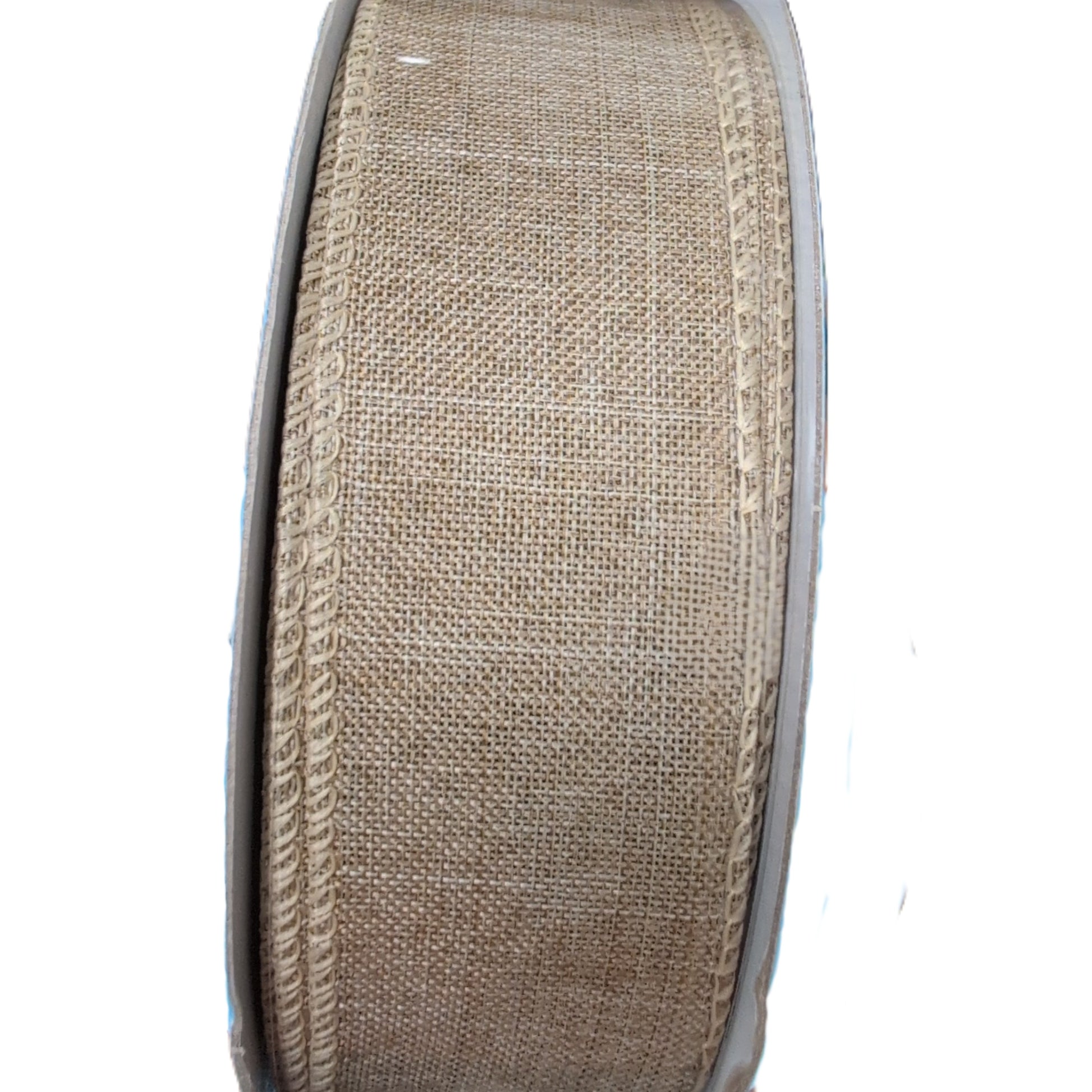 Spool of beige burlap ribbon on a white background