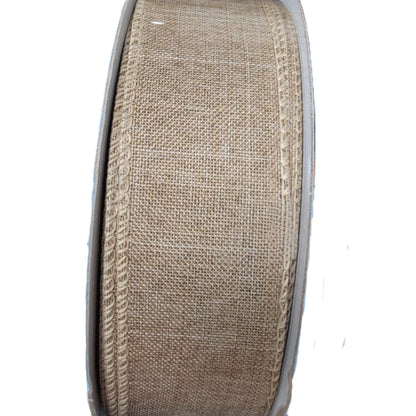 Spool of beige burlap ribbon on a white background