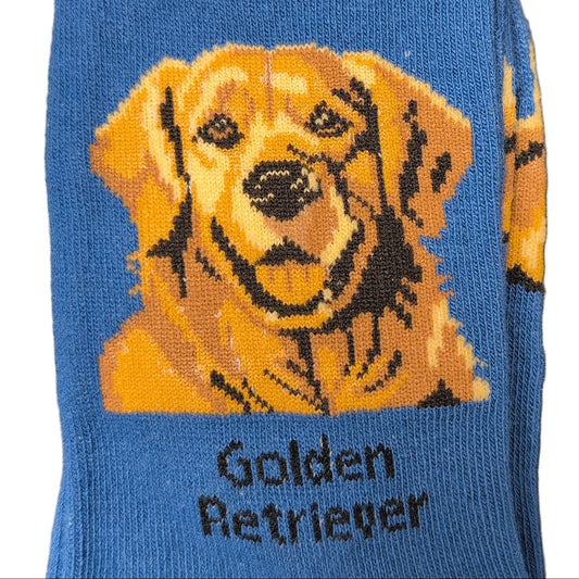 Blue socks with a Golden Retriever design and 'Socks By Lucy' packaging.