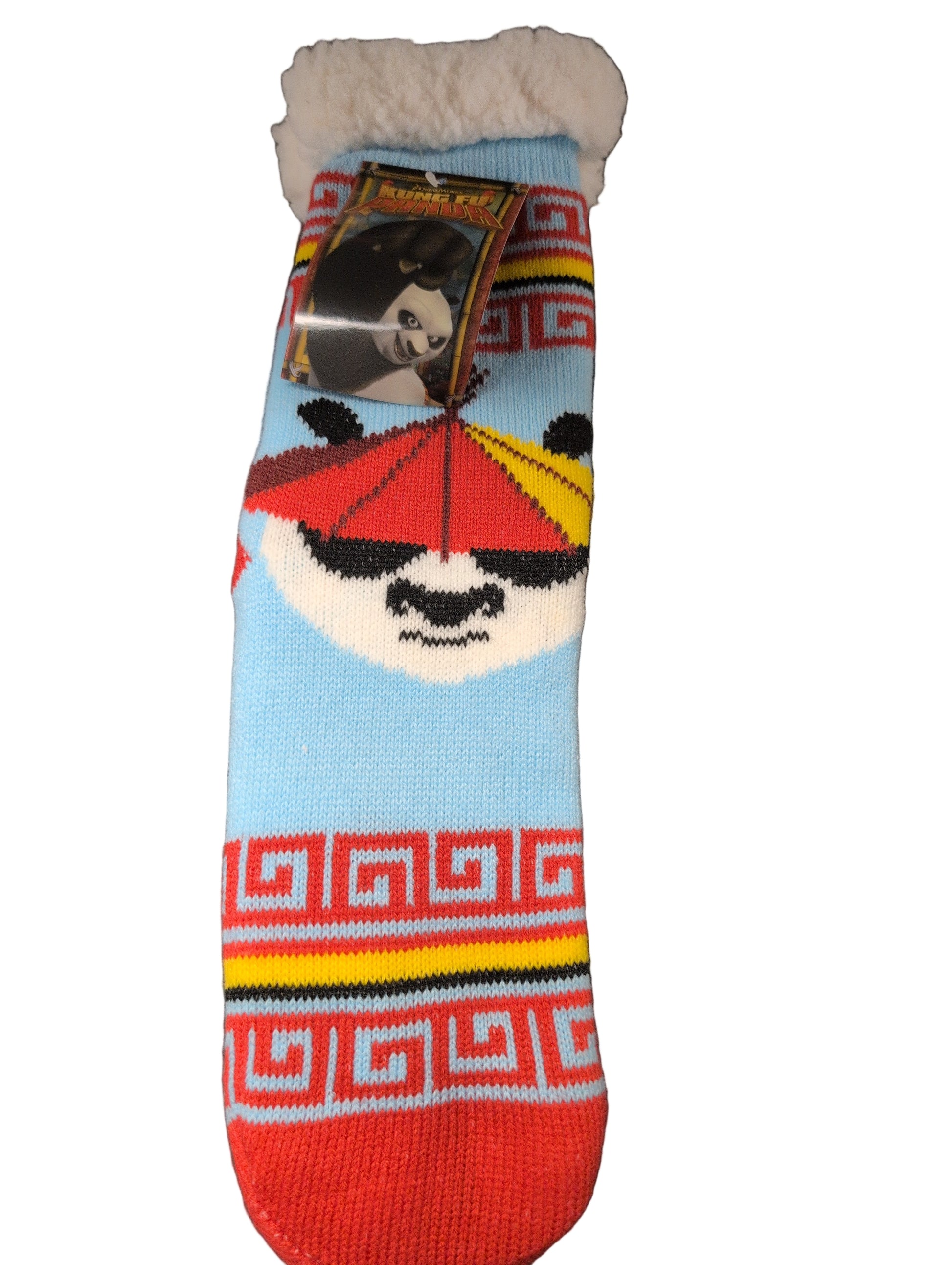 Colorful sock with cartoon design on a dark surface