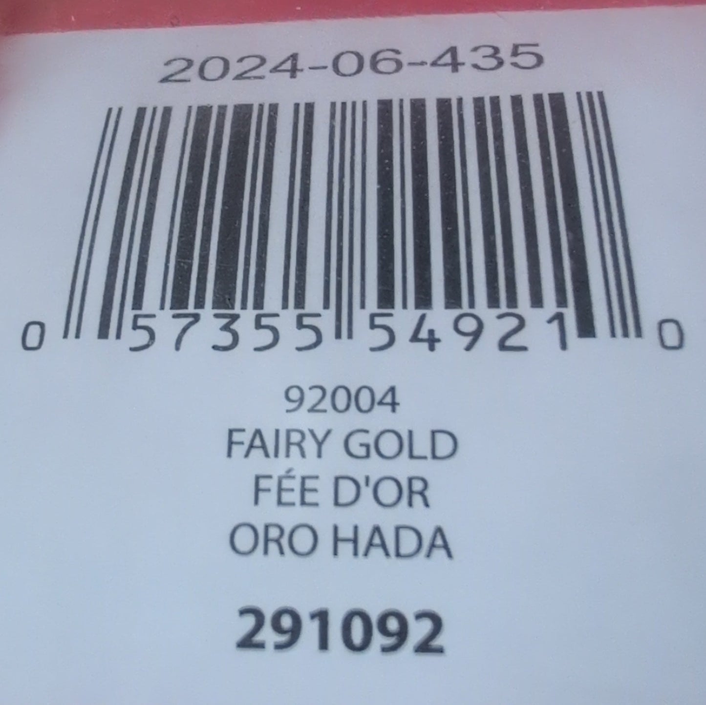 Product packaging with a label and barcode on a red background