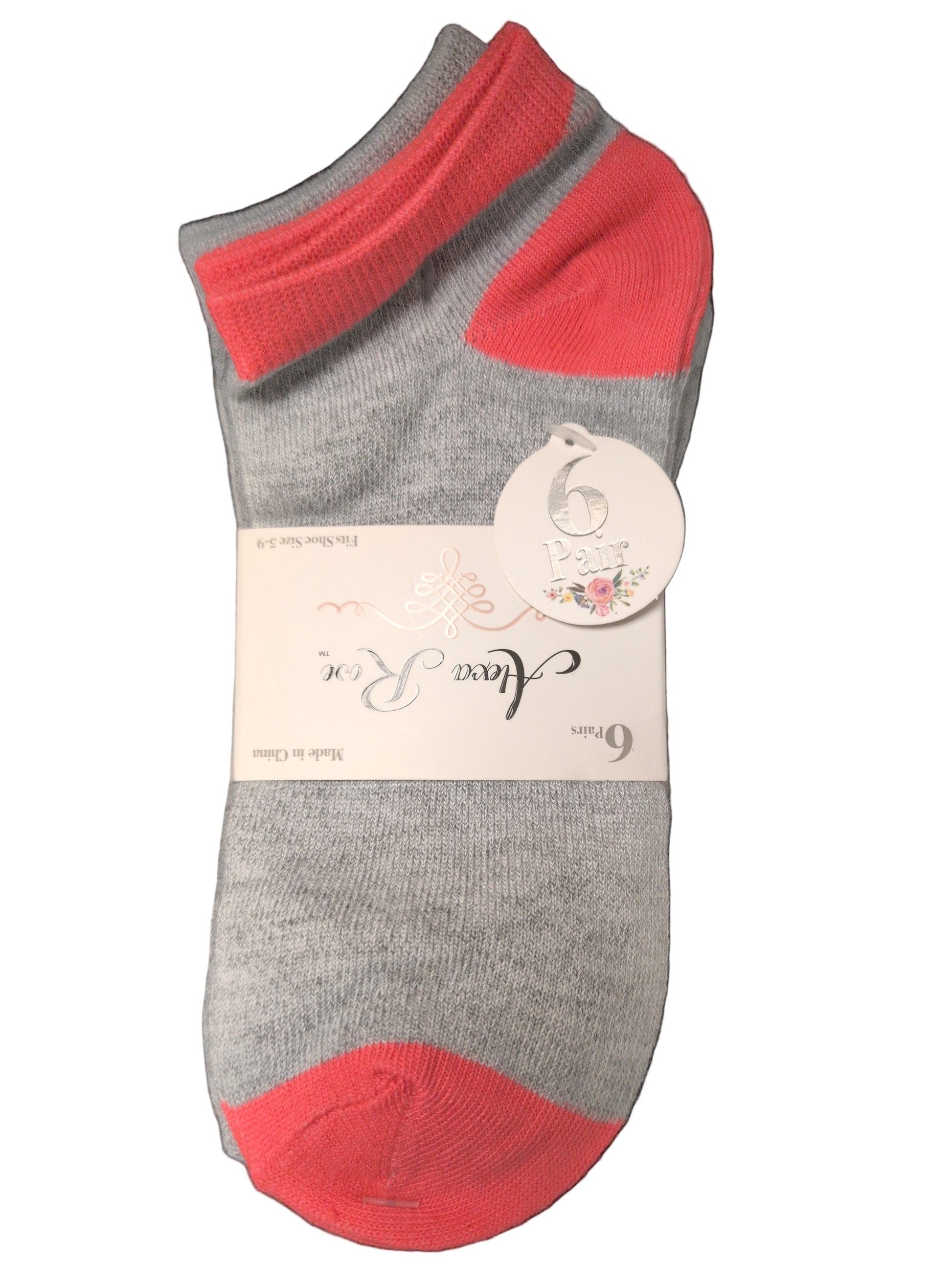 Gray ankle sock with red accents on a dark surface