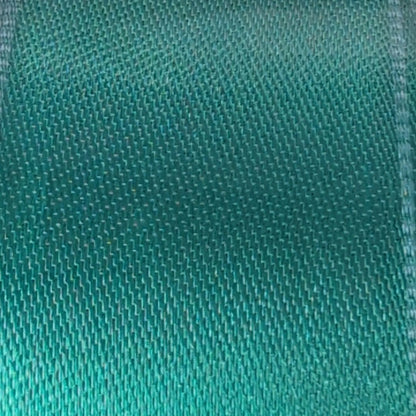Green ribbon with a reversible label on a white background