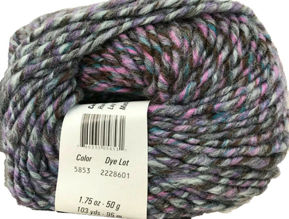 Multicolored skein of yarn with a label on a white background