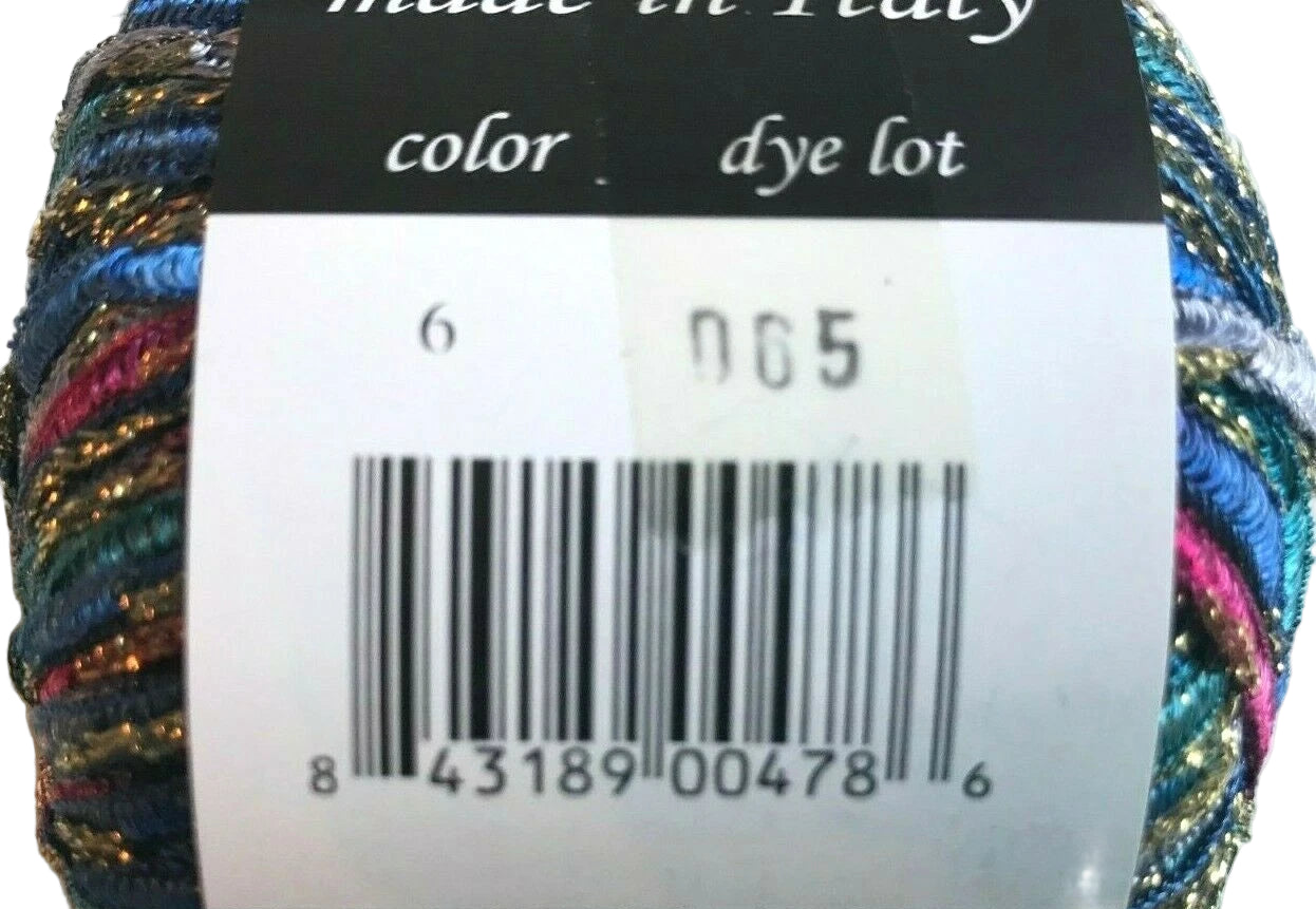 Multicolored yarn with a label showing 'made in Italy' and product details.