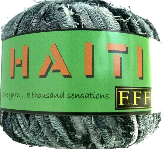 Ball of yarn with a green label displaying the brand 'Haiti'.