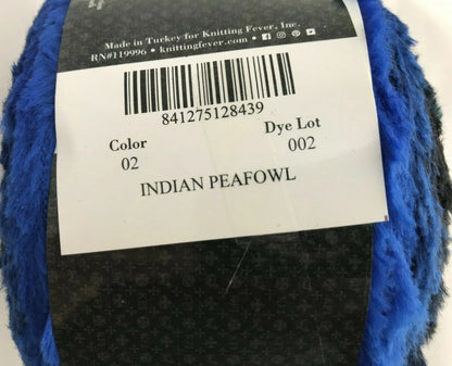 Yarn ball with a label indicating 'Indian Peafowl' color and brand information.
