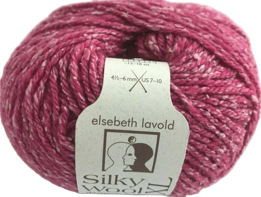 Pink yarn ball with Elsebeth Lavold Silky Wool label on a white background